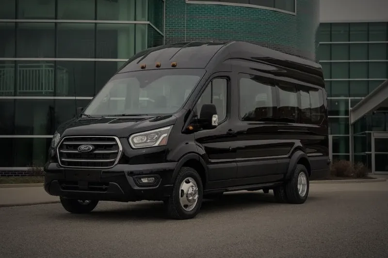 Black Ford Transit passenger van